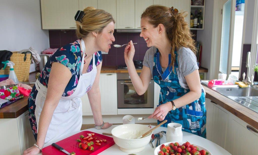 Lucy Woodhouse and Meriel Kehoe, founders of Claudi and Fin, working at home