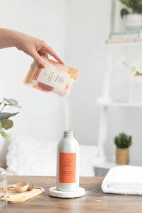 ethosa pouring product into container