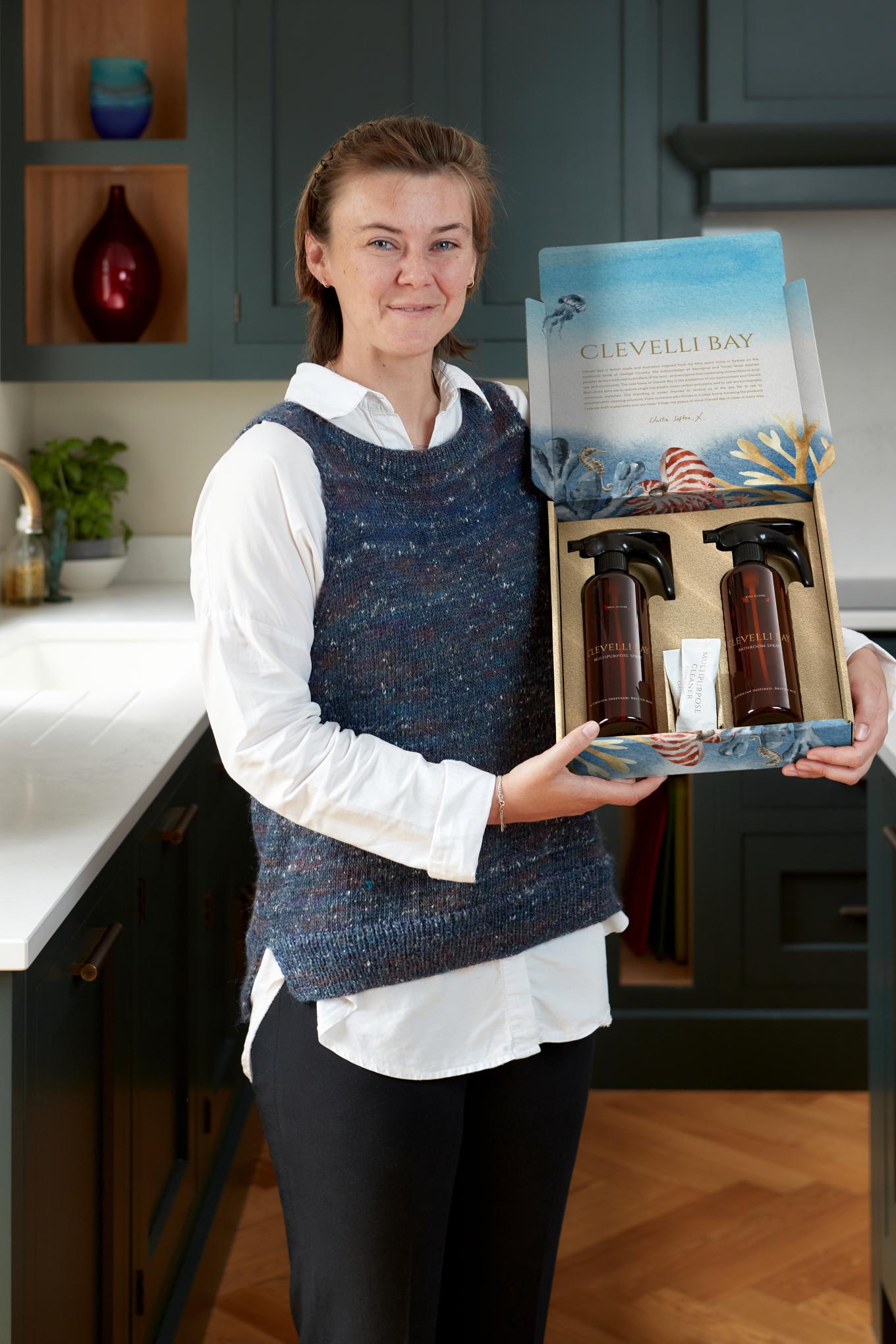 lady holding up a product display