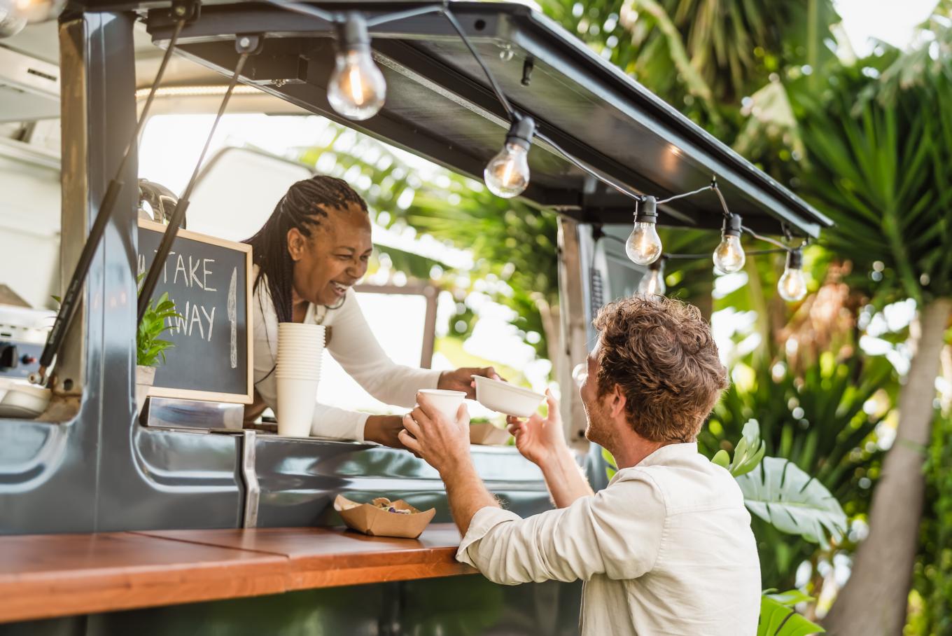 Customer being served at food stall